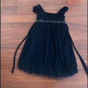 Roxette Black Dress with Beaded band detail. Size kids M